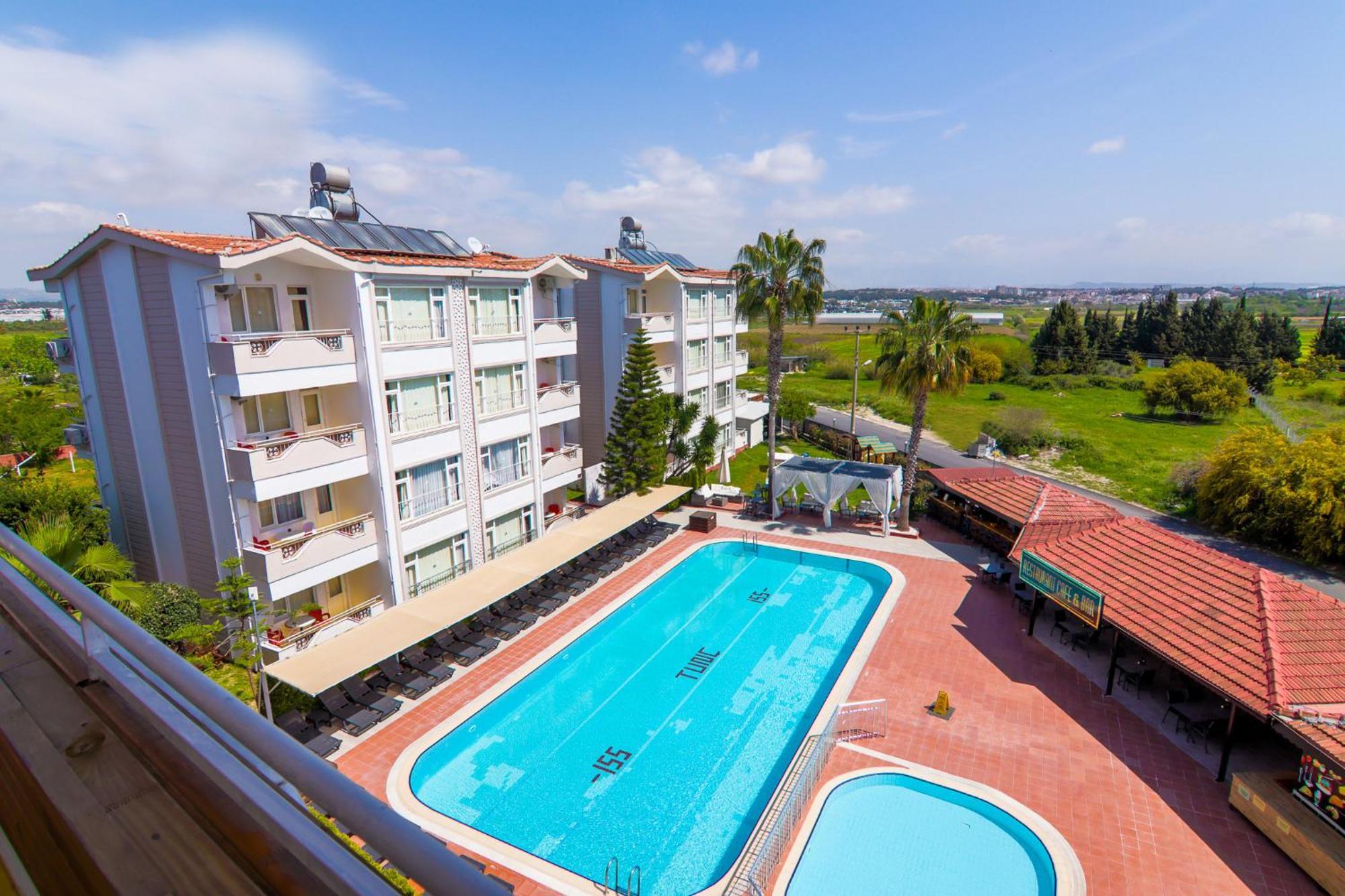 New Garden Hotel Side Exterior foto